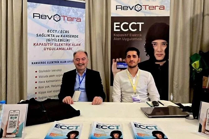 Two men at a RevoTera booth featuring ECCT and ECBS wearable capacitive electric field products